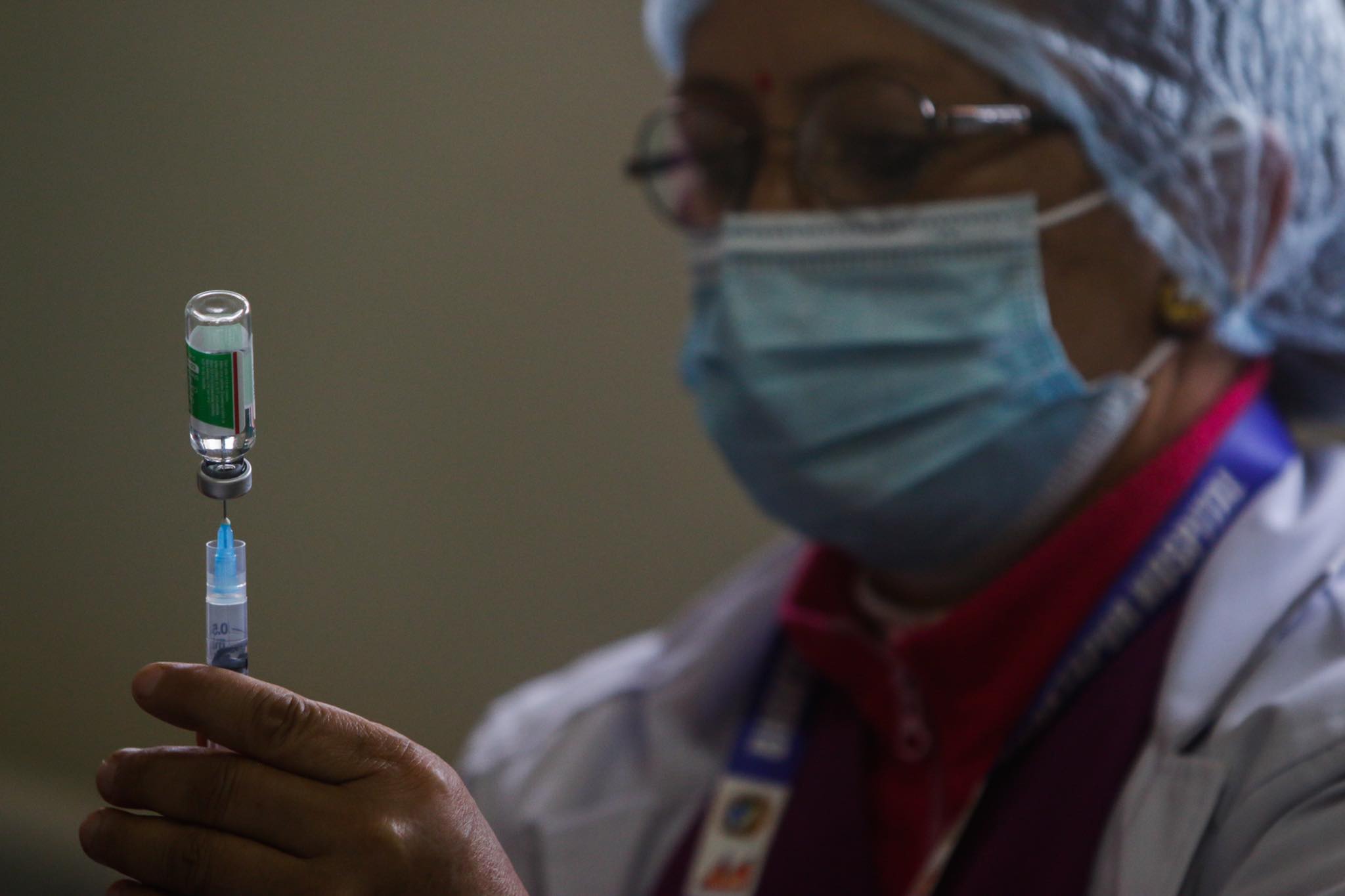 health workers receive covid vaccine