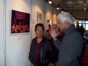 Singer Ambar Gurung tours the photo exhibition. PHOTO: ARPAN SHARMA
