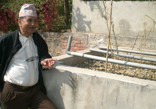 100 YEAR PLAN: Homnath Adhikari of Namsaling in Ilam at a pilot waste-water treatment plant that he helped set up. 