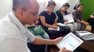 Ameet Dhakal with his iPad.