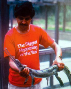 FIRM GRIP: Hemanta Mishra with a gharial bred in captivity in Chitwan in 1977 before releasing it into the wild.