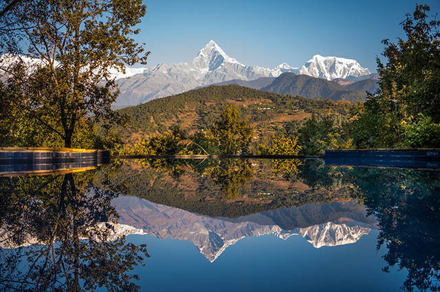 On clear days, the swimming pool at Tiger Mountain Pokhara Lodge offers a stunning reflection of Machapuchre. Photo: Thomas L Kelly