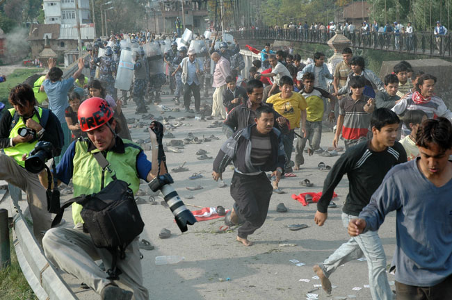 Violent protests erupted all over the country in opposition to the king's move. 