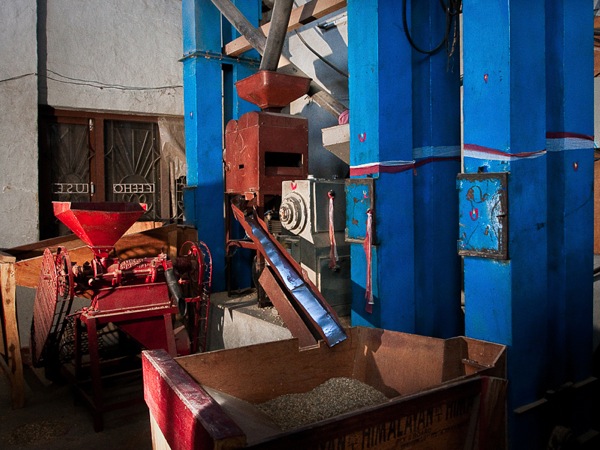 This machine runs the processes of hulling, polishing, cleaning and sorting. Final grading is done by hand to ensure quality control.