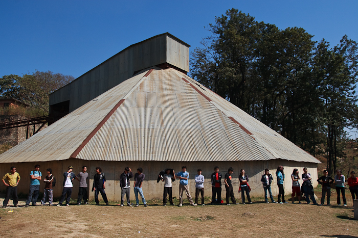  The students arrived and were gathered in front of an abandoned cement factory, forced by the locals to shut down in the past due to over-pollution.  