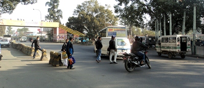People jaywalk across the street instead of using the bridge. Photo: Min Ratna Bajracharya
