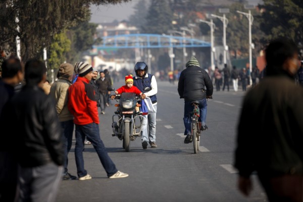 Pushing motorcycle during strike 