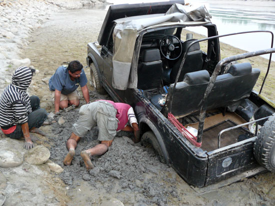 In the road: bogged down on the banks of the Narayani