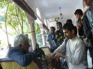 Om Puri shares a quiet moment with friends
