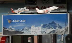 A notice at the Agni Air counter in the Kathmandu Domestic Airport announces that all the flights of the day have been cancelled.