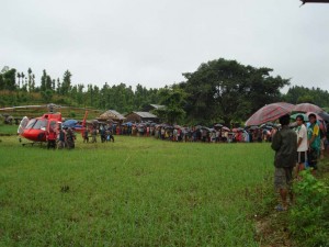 A Fishtail air helicopter reaches the crash site.