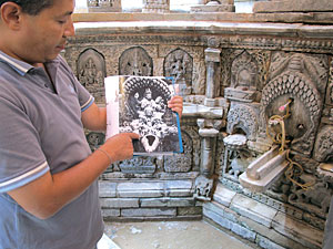 KVPT's director Rohit Ranjitkar compares a photograph taken 110 years ago for accurate restoration of Sundari Chok.