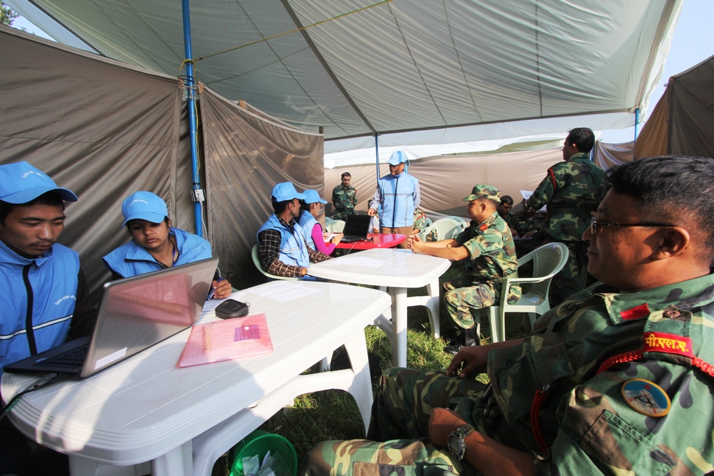 The regrouping team assesses the combatants. 