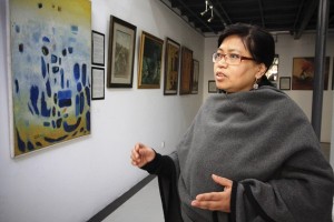 Neera Joshi, botanical artist and curator of the gallery, is responsible for setting up the exhibition.