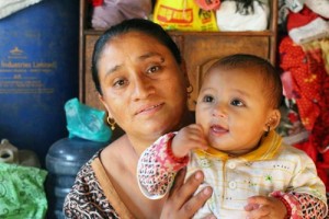 HAPPY FAMILY: Rashmila Awal with her seven-month baby, Sonish, who was pulled out of the rubble of their home in Bhaktapur after 22 hours. Photo: Sahina Shrestha