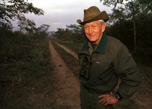 PHOTO COPYRIGHT CHARLIE VARLEY PIX USA/SIPA PRESS, PARIS. +1 305 673 0798/+1133 147 434 707. WORLD RENOWNED TIGER SPECIALIST CHUCK McDOUGAL STANDS ON A TRACK IN THE ROYAL CHITWAN NATIONAL PARK IN NEPAL. CHUCK AND HIS ASSISTANTS ARE SETTING CAMERA TIGER TRAPS TO IDENTIFY THE PARKS' POPULATION. PHOTO; CHARLIE VARLEY. DEC 99.