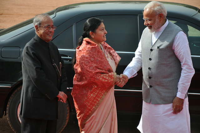 President of India Pranab Mukharjee and Indian Prime Minister Narendra Modi receives President Bidya Devi Bhandari at the Rastrapati Bhawan in New Delhi on Tuesday