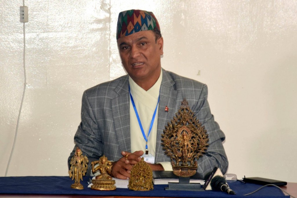Director General of Department of Archaeology Bhesh Dahal with the stolen statues that were willed back to Nepal by US collector.