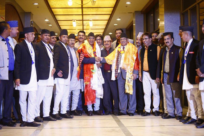 New Prime Minister Sher Bahadur Deuba with ex-Prime Minister Pushpa Kamal Dahal. Parliament elected Deuba as Nepal's 10th Prime Minister in 10 years on Tuesday. Bikram Rai