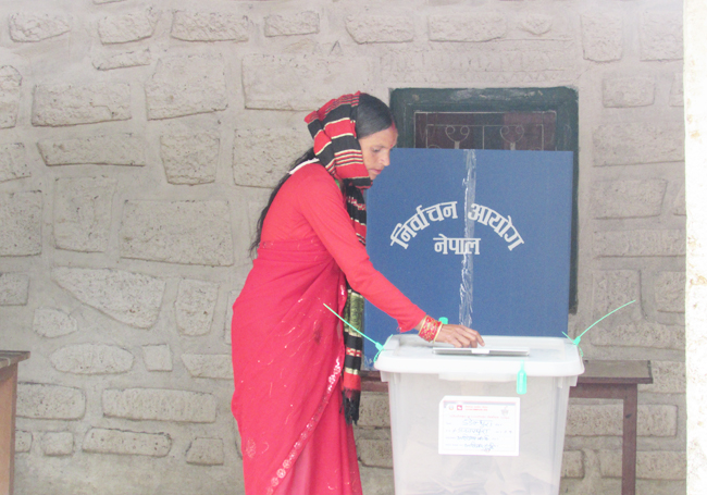 A woman casts her vote in the second phase of local elections in Dadeldhura last week. Pic: Bachu BK